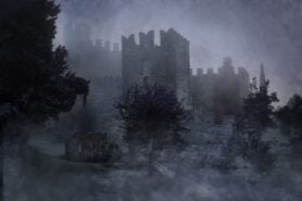 castle ruins hidden by fog and darkness